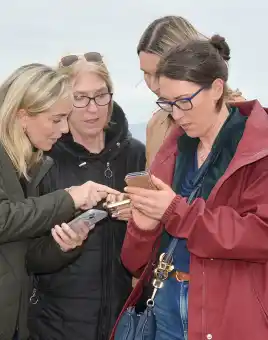 Team posing together at Galway Bay Hotel during Digital Treasure Hunt team building activity