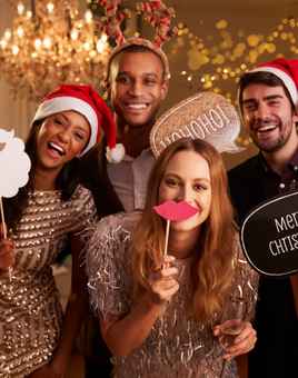 people wearing fun props at christmas party