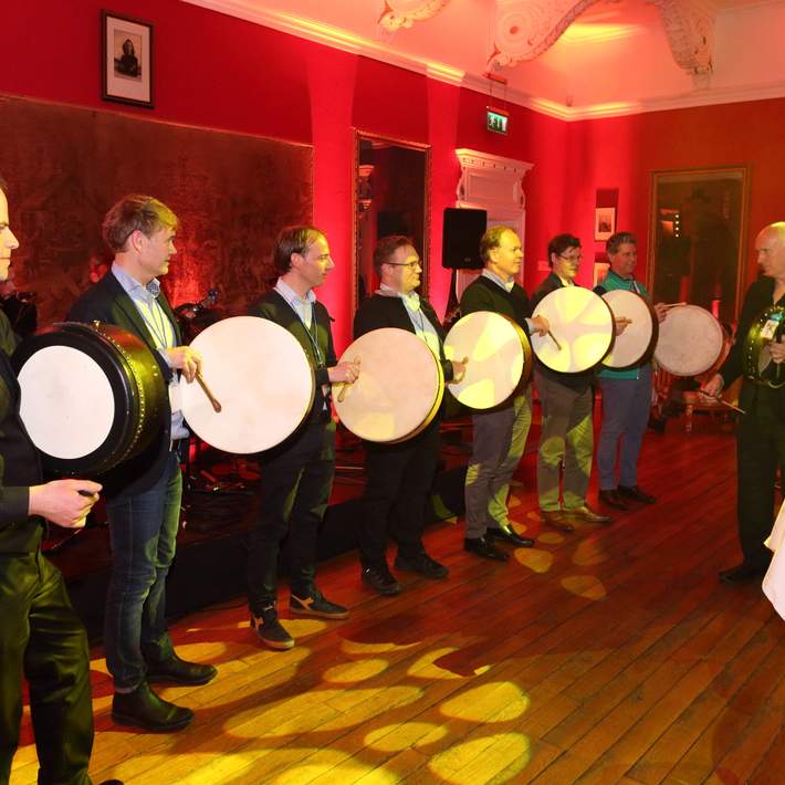 men playing bodhran