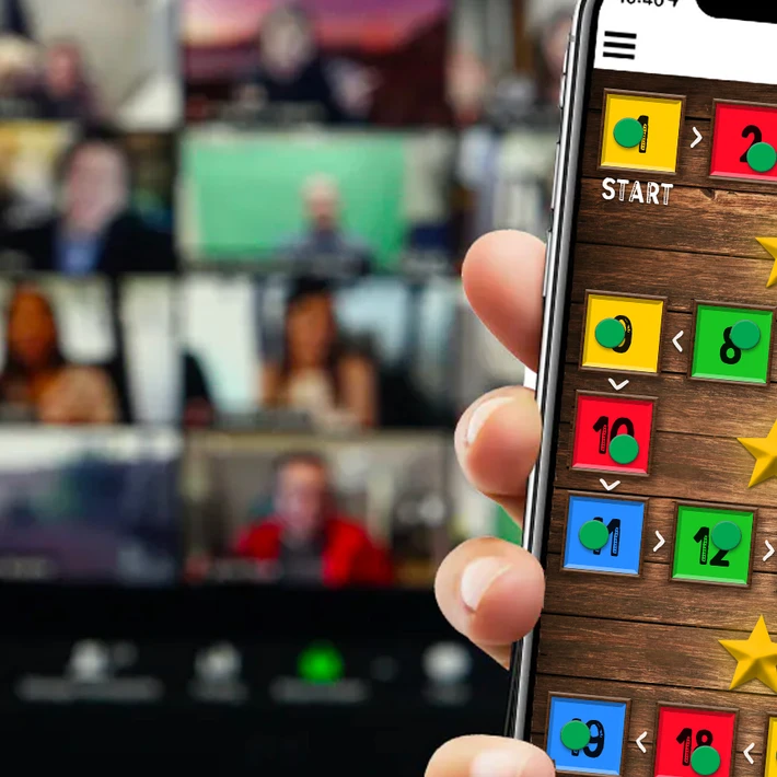 Remote team taking part in a Virtual Away Day team building event with an online challenge displayed on a smartphone.