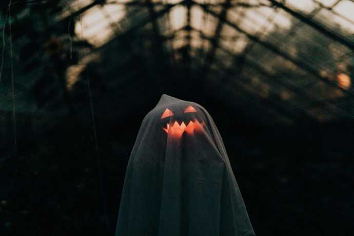 Spooky ghost in an abandoned shed