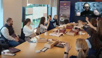 ABP Food Group graduates joining a multi location digital treasure hunt across Ireland and the UK, with a remote event host briefing teams live over video call.