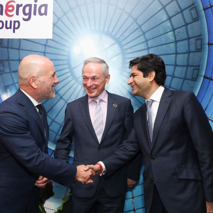 people shaking hands ant energia group launch event