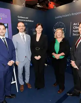 Representatives at the National Cyber Security Centre (NCSC) exhibition stand during the Cyber Expo at The Convention Centre Dublin.