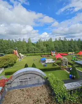 Overview of event set up from the roof of palmerstown house with blue skies.
