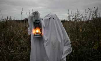 A ghost holding a lantern