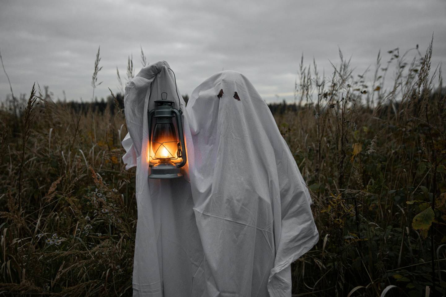 A ghost holding a lantern