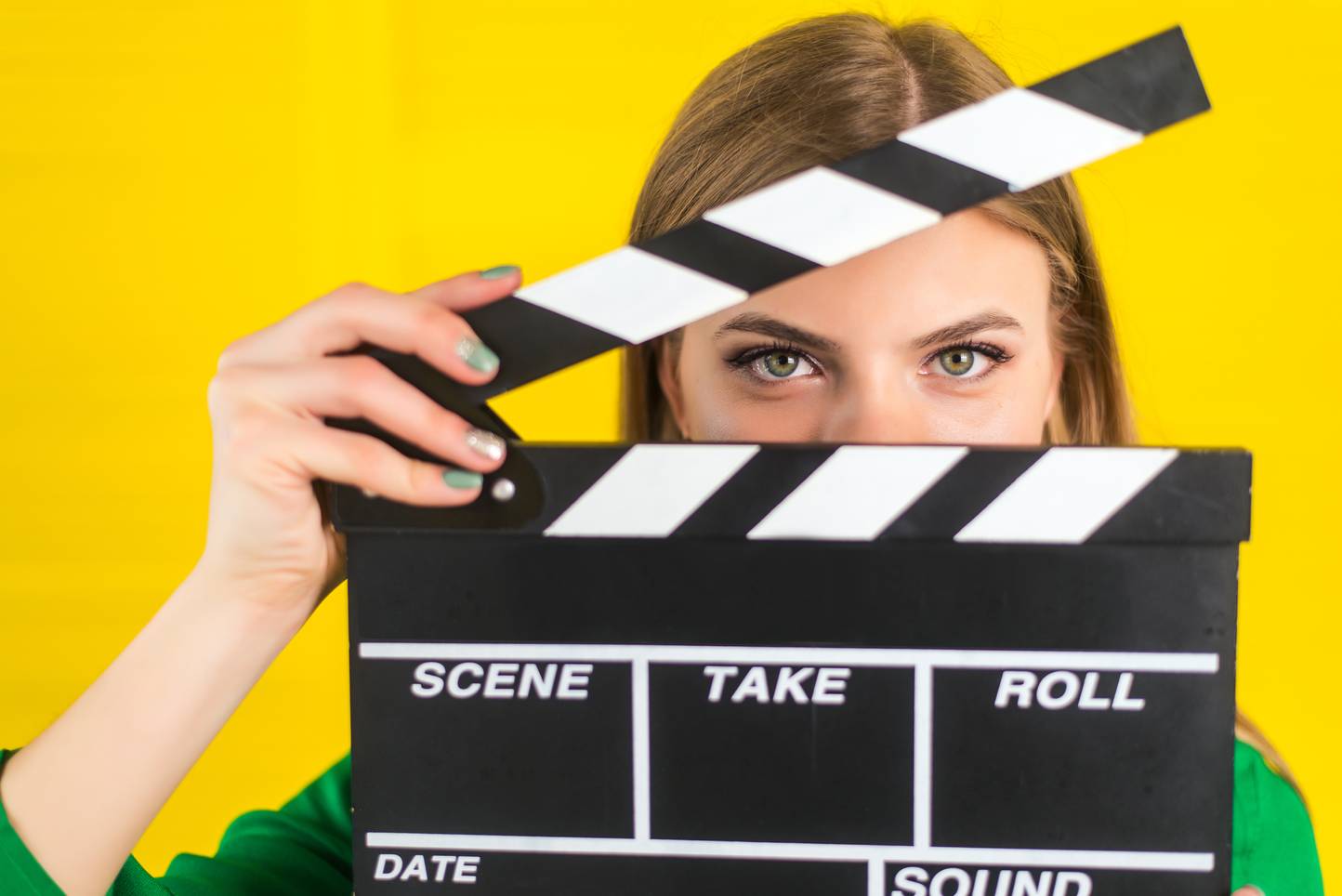 women with clapper board