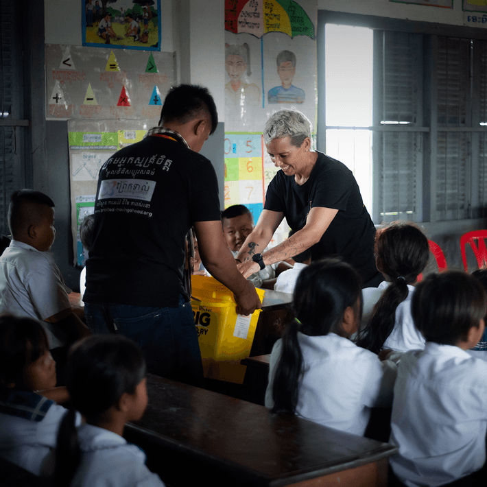 solarbuddy being handed out in classroom