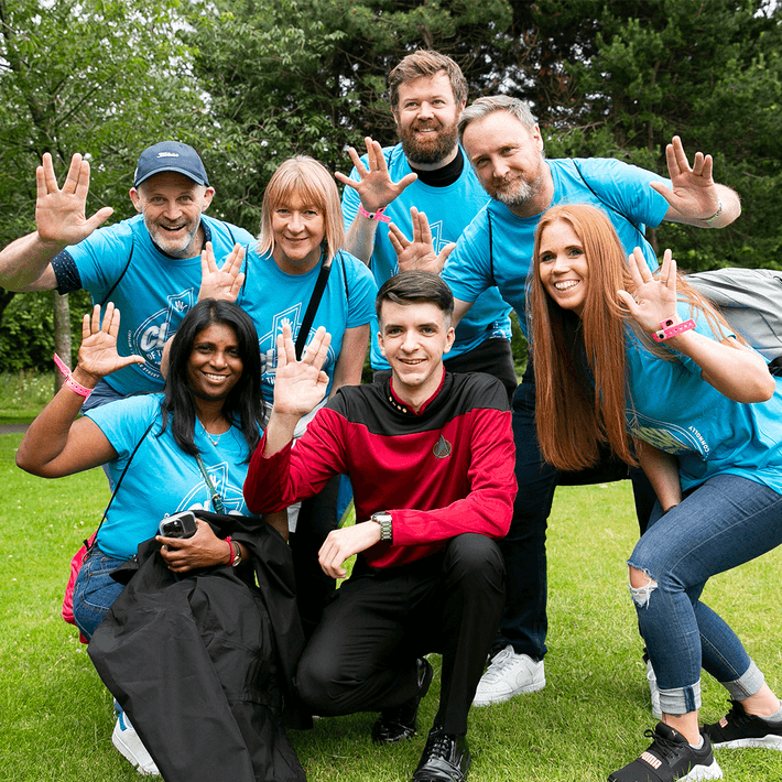 happy group with star trek actor