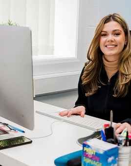 lauren at desk