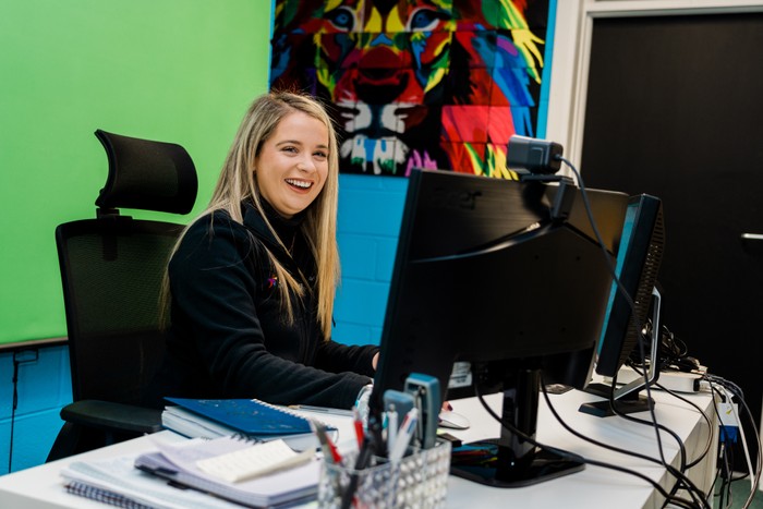 megan at desk