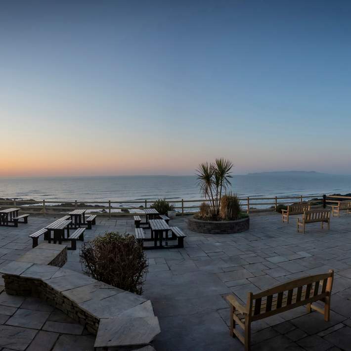 the shoreline hotel terrace at sunset