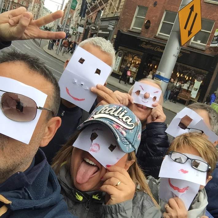 people with paper masks