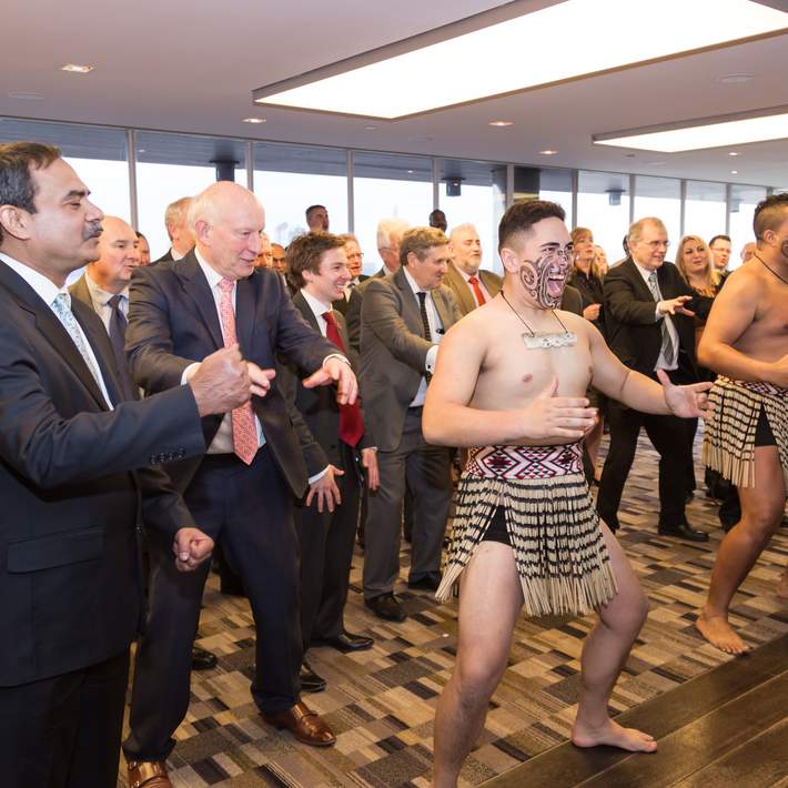 corporate group doing haka workshop